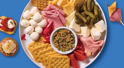 Charcuterie board with assorted crackers, deli meats, cheeses